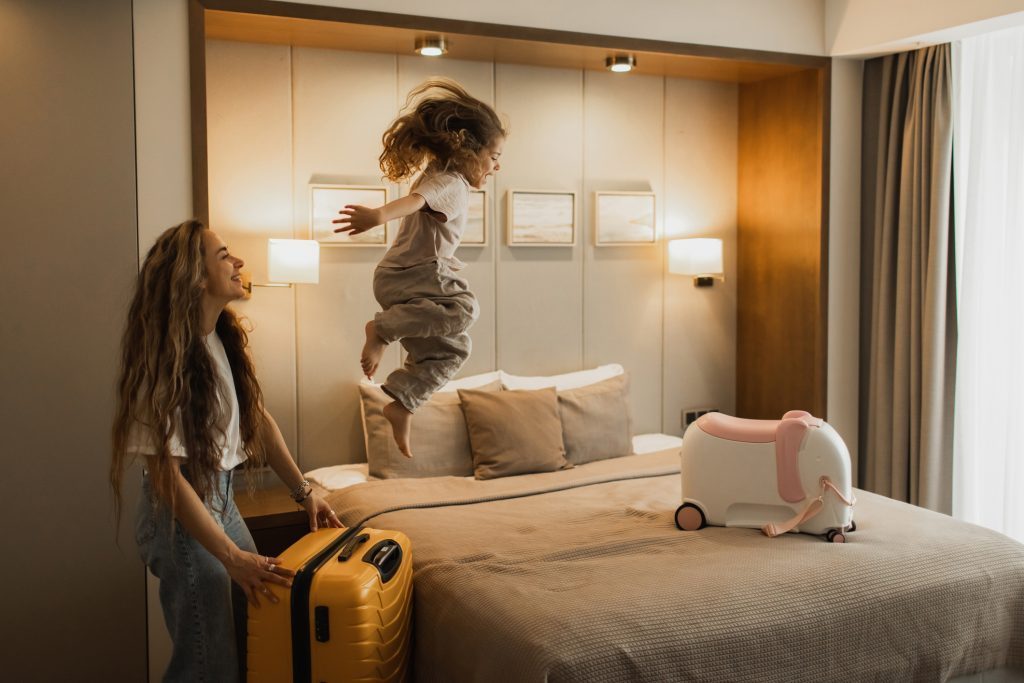 Traveler reviewing a combined flight and hotel booking on a laptop