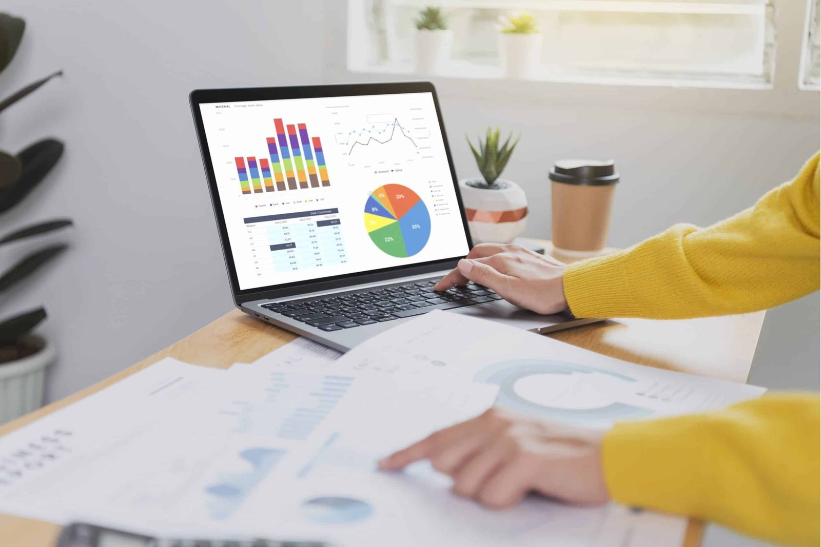 laptop showing travel data and analytics for corporate travel decisions