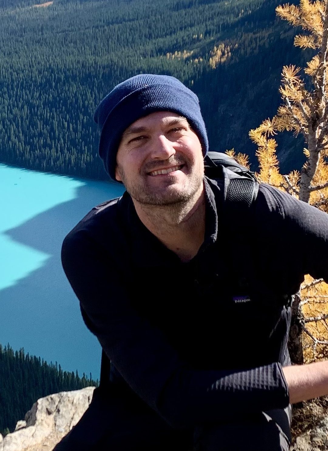 Travelers walking through a large airport terminal, emphasizing the time needed to make connections