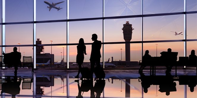 airport terminal with passengers during a layover