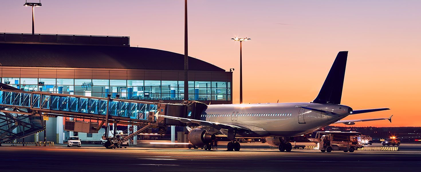 Airport at the colorful sunset. By Chalabala