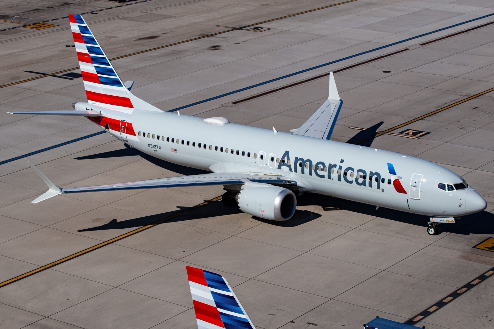 American Airlines passenger plane taxiing to gate