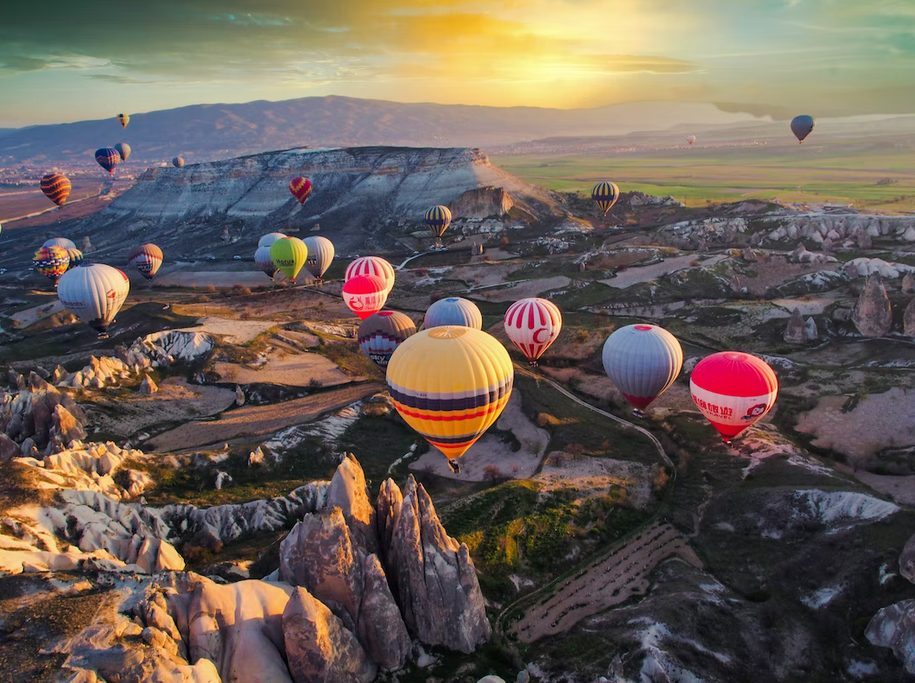 Illustration of hot air balloons over Cappadocia, representing a once-in-a-lifetime travel splurge.