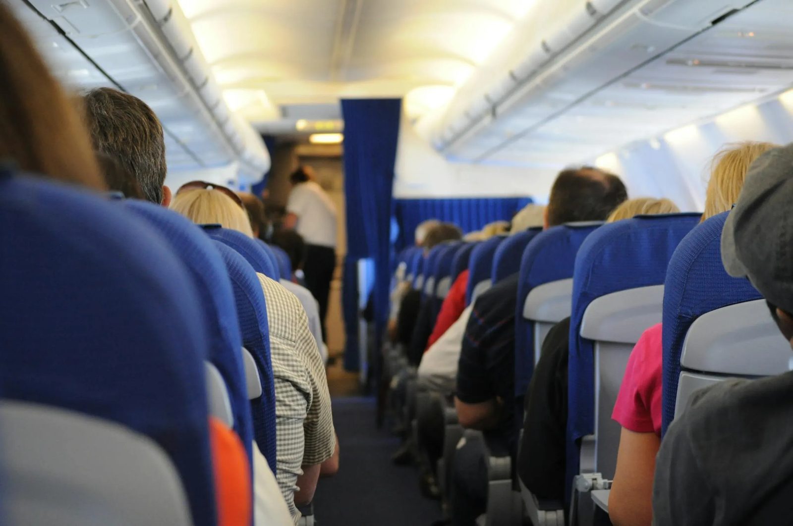 Traveler reviewing receipts and planning a realistic travel budget