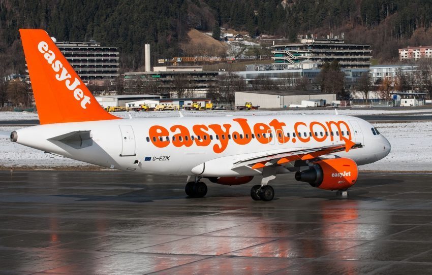An easyJet Airbus A319 on the tarmac at Innsbruck Airport, illustrating a typical European budget airline aircraft.
