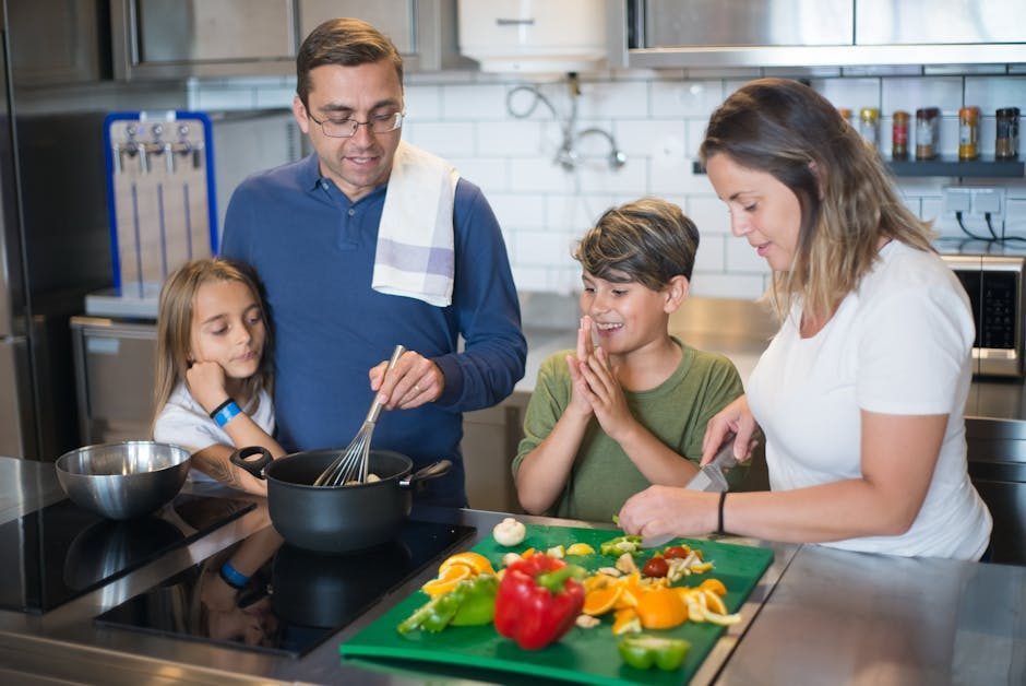 Family preparing food together in a bright vacation rental kitchen