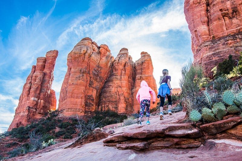 Two girls hiking on a family road trip adventure