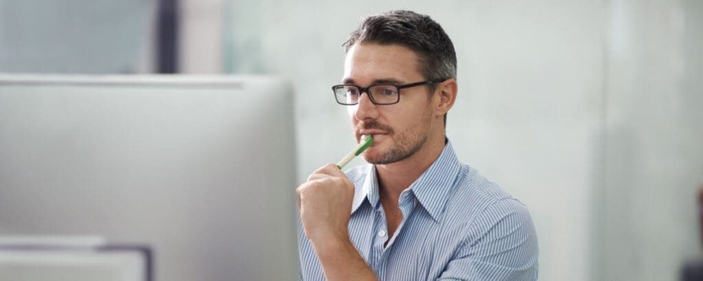 Traveler comparing flight options on a laptop