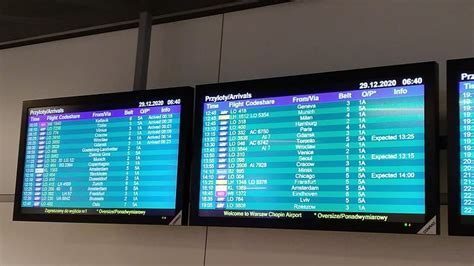 empty night airport terminal with flight schedule display