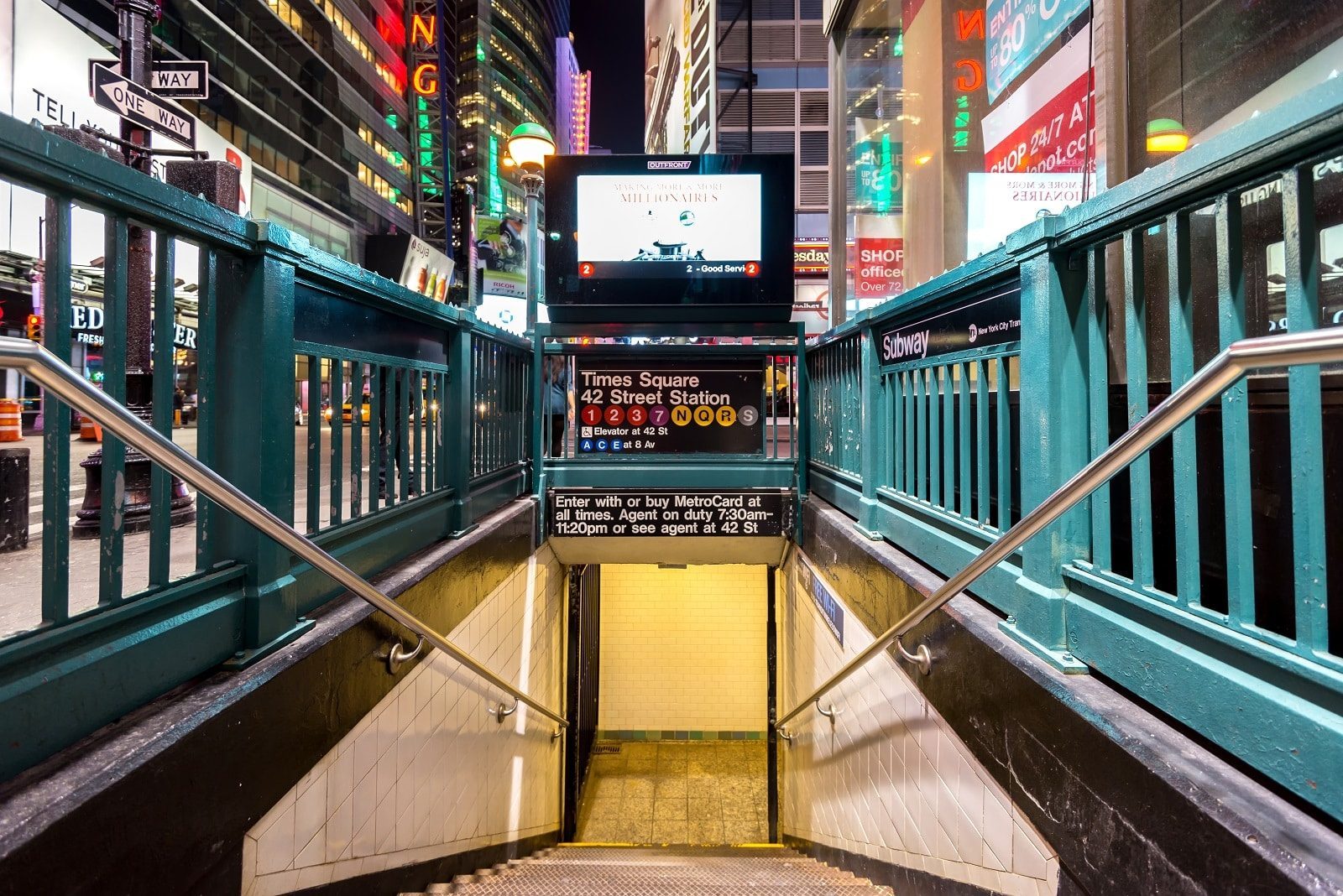 Commuters navigating a busy metro system in a major city