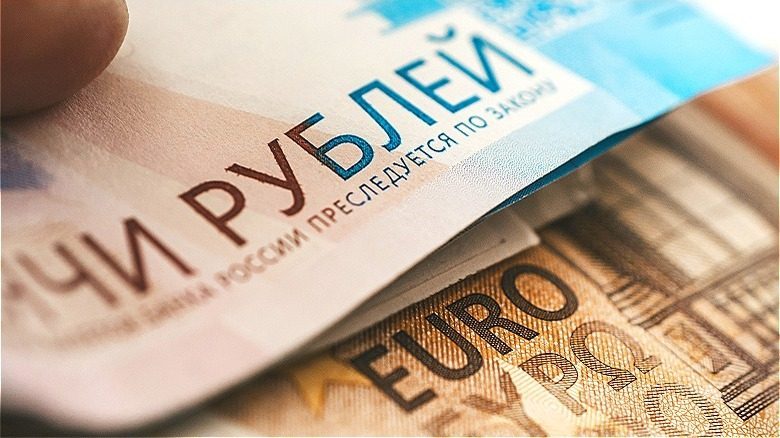 Person holding foreign currency