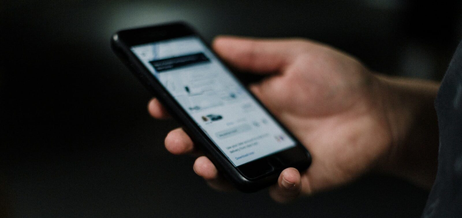 Traveler using a rideshare app in a foreign city